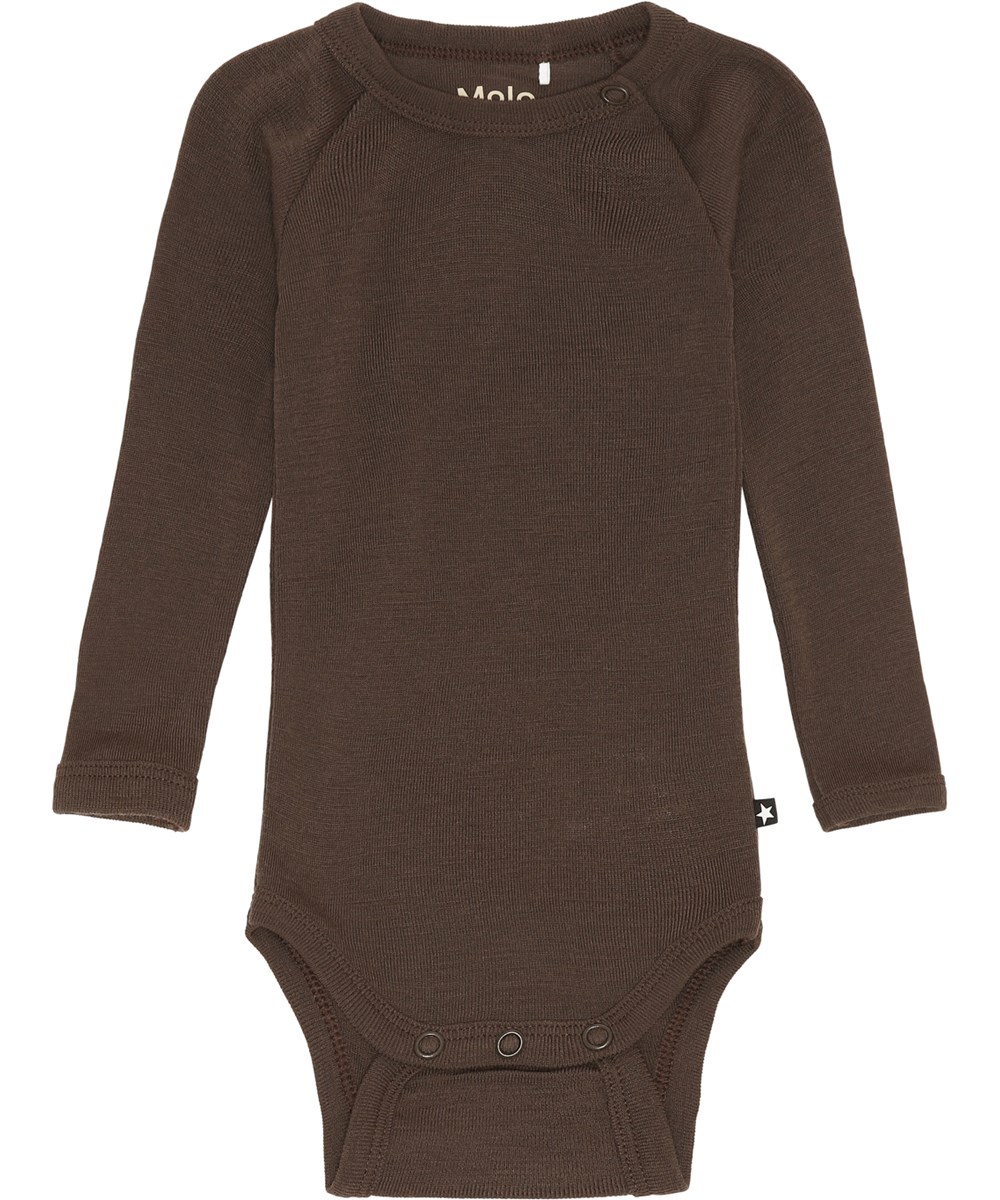 Farai è un body neonato viola chiaro in 100% lana. Farai ha una facile chiusura a scatto al collo e tra le gambe
